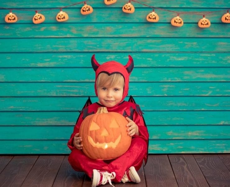 boy in devil costume Halloween