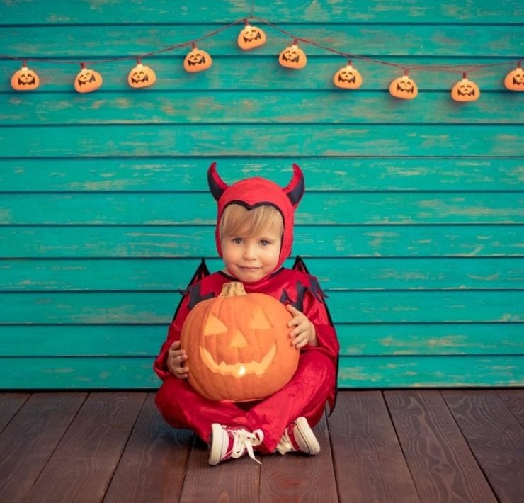 boy in devil costume Halloween