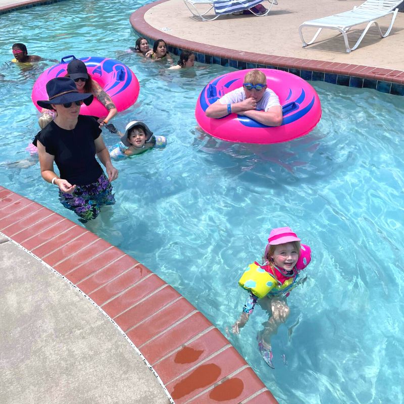 family enjoying the Lazy River at Point Mallard water park