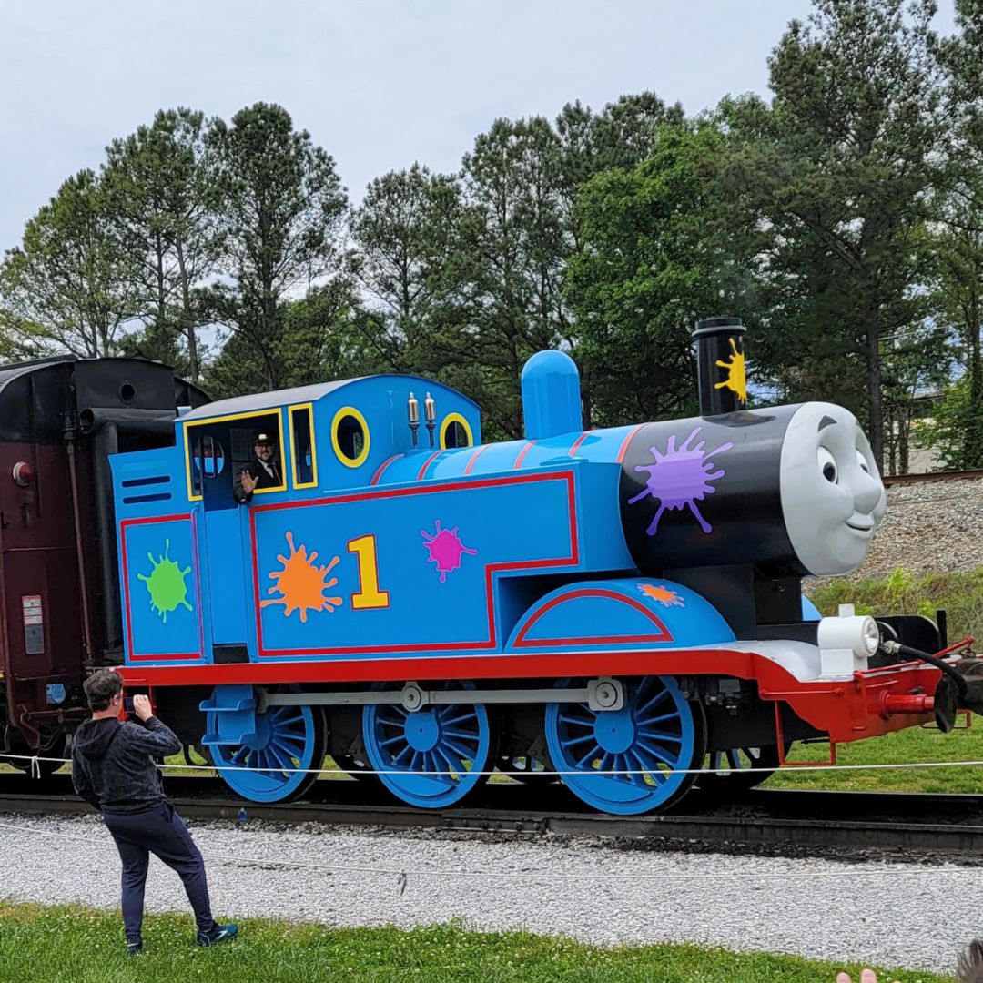 A Thomas the Train engine replica waits on the tracks for a special train ride at the Tennessee Valley Railroad Museum.