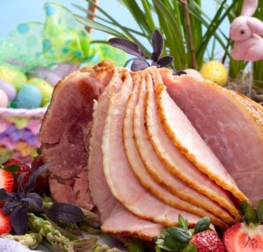 ham served surrounded by Easter decorations