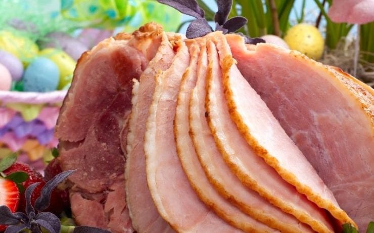 ham served surrounded by Easter decorations