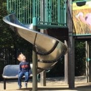 Delano Park in Decatur AL boy on slide