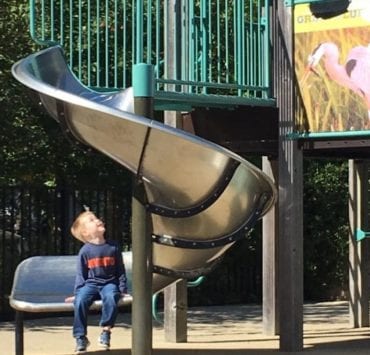 Delano Park in Decatur AL boy on slide