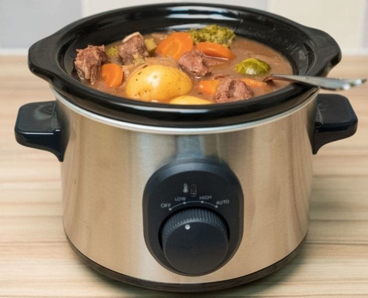 slow cooker or crockpot full of ingredients