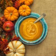 bowl of pumpkin soup on a Fall tablescape
