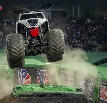 monster mutt flies through the air at Monster Jam show