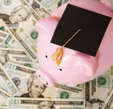 pink piggy bank wearing a graduation cap