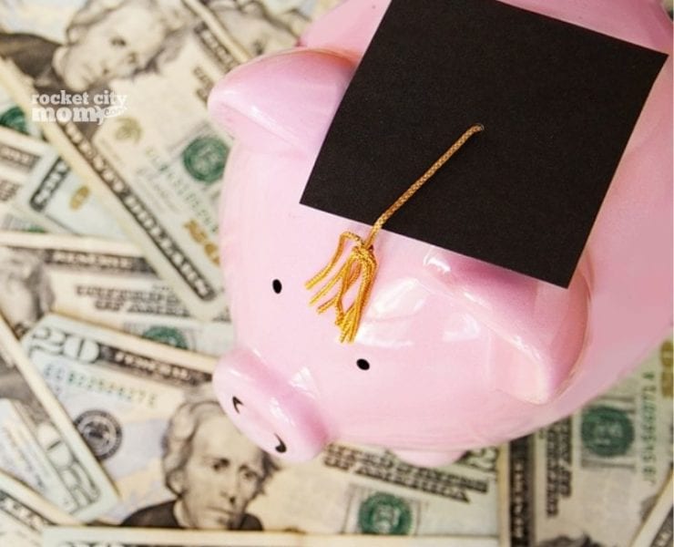 pink piggy bank wearing a graduation cap