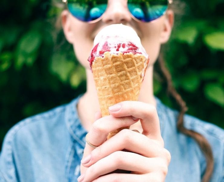 woman holding ice cream cone