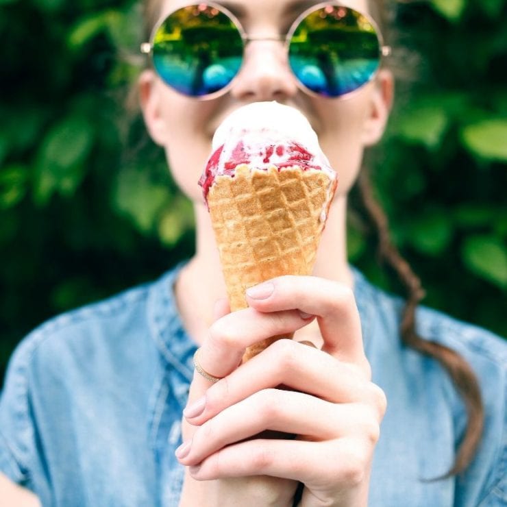 woman holding ice cream cone