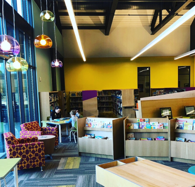 children reading in the kids area of the Madison Public Library