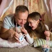 da and daughter drinking hot cocoa
