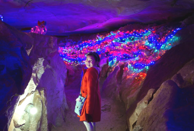 colorful lights in a cave at Santa's Underground Workshop