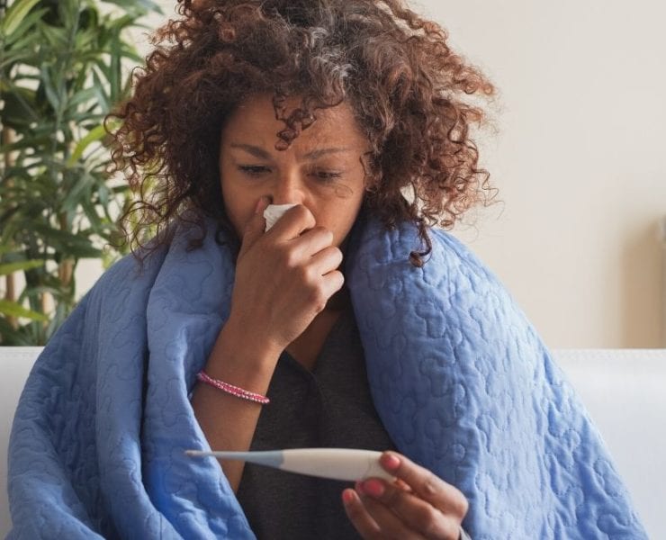 sick woman on the couch