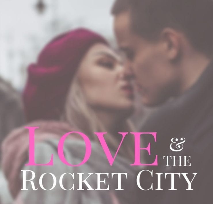 a man and a woman embracing kissing