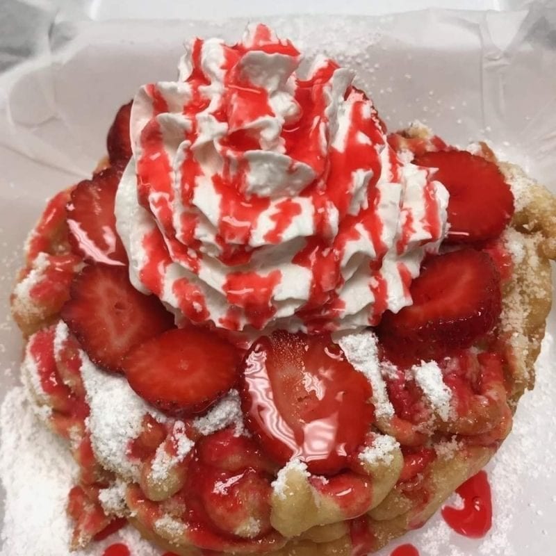 Strawberry cheesecake is a popular choice among customers at Royalty Funnel Cakes.