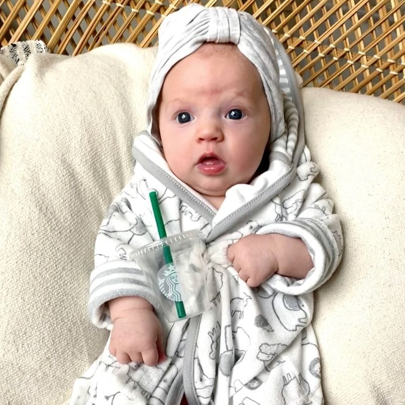 A baby spa day is the theme of this DIY photoshoot that's complete with a baby bath robe, head wrap and even a small Starbucks cup.