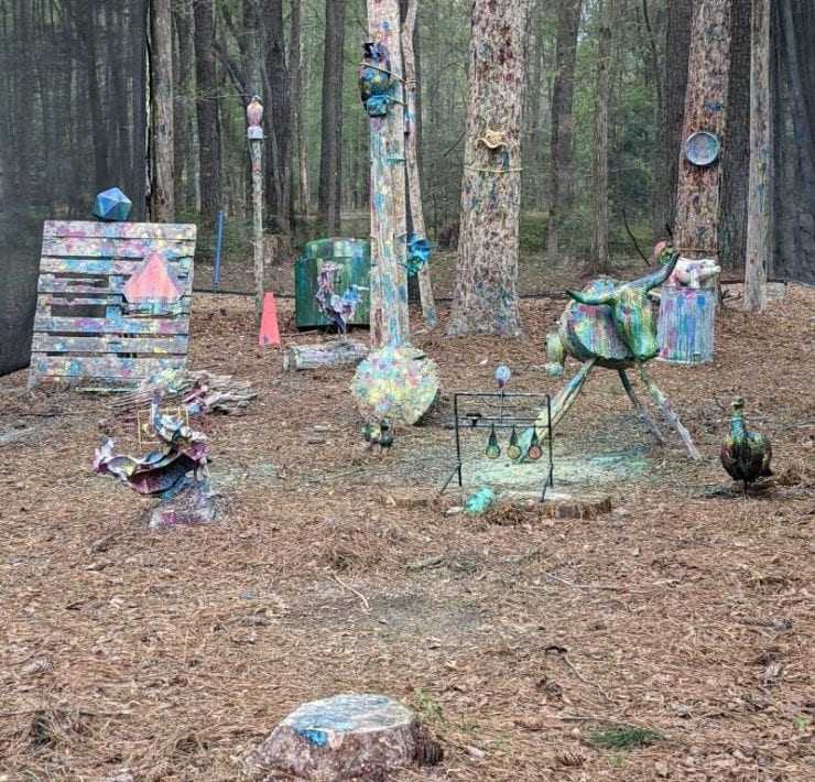 Paint splattered targets make up the paintball area of GoFar USA Park.