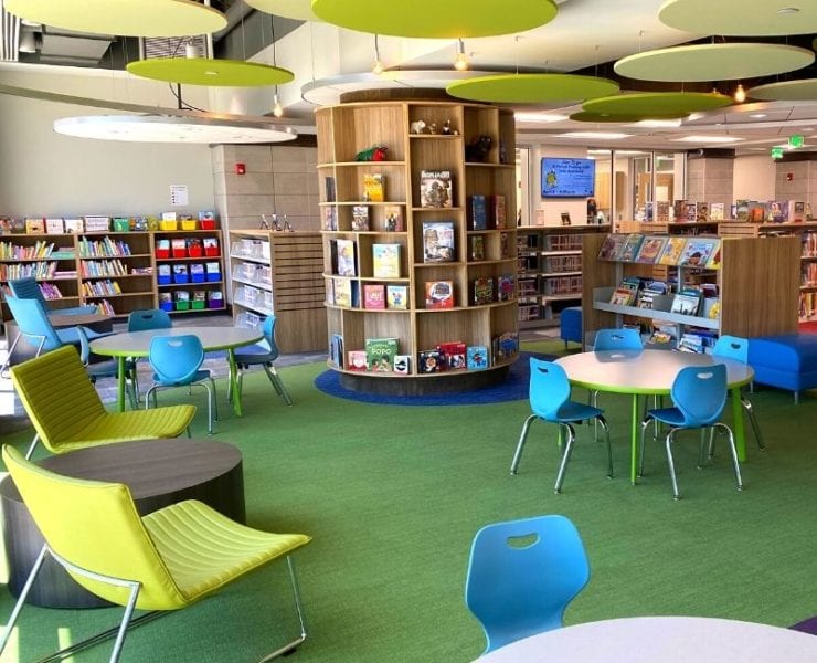 colorful tables and chairs in the kids section of the new North Huntsville Library