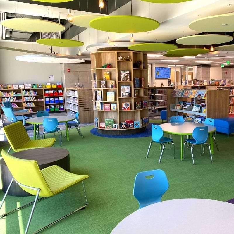 colorful tables and chairs in the kids section of the new North Huntsville Library