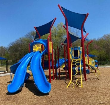 Colorful playground equipment at the Robert Shurney Legacy Center playground Huntsville AL