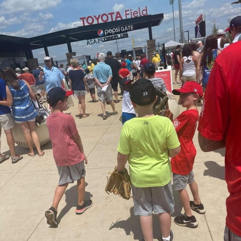 Many people lining up outside of Toyota Stadium to watch the Trash Pandas play. 