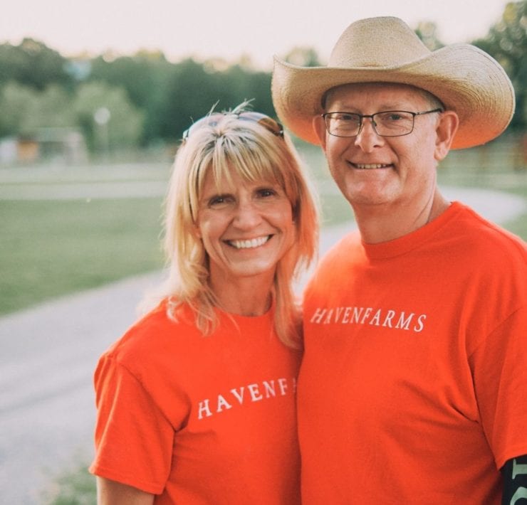 LeAnn and Scott Newsom proudly wear their Haven Farms tshirts on the quaint farm property in Hazel Green.
