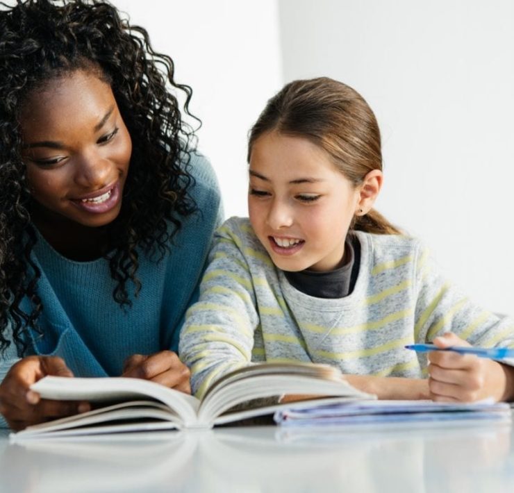 girl studying with her tutor