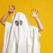 child in a ghost costume