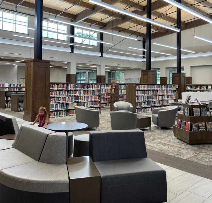 Seating and tables are conveniently places among book shelves for easy reading at the South Huntsville Library.