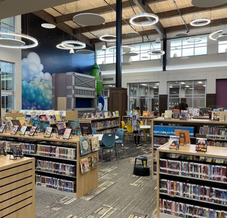 The children's area of the library has shorter shelving for smaller readers.
