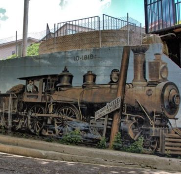 A mural of a train is part of the new North Alabama Mural Trail.