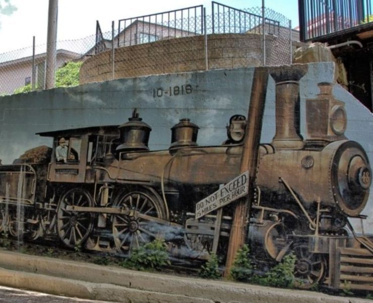 A mural of a train is part of the new North Alabama Mural Trail.