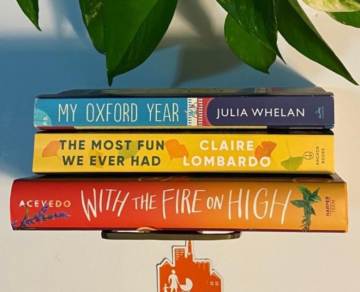 stack of book titles from the Rocket City Mom book club in huntsville AL