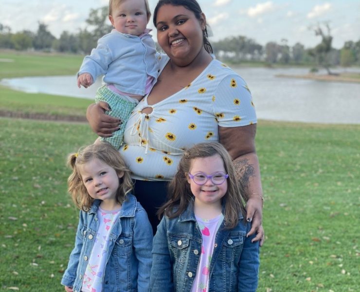 An au pair in America participant poses with her family.