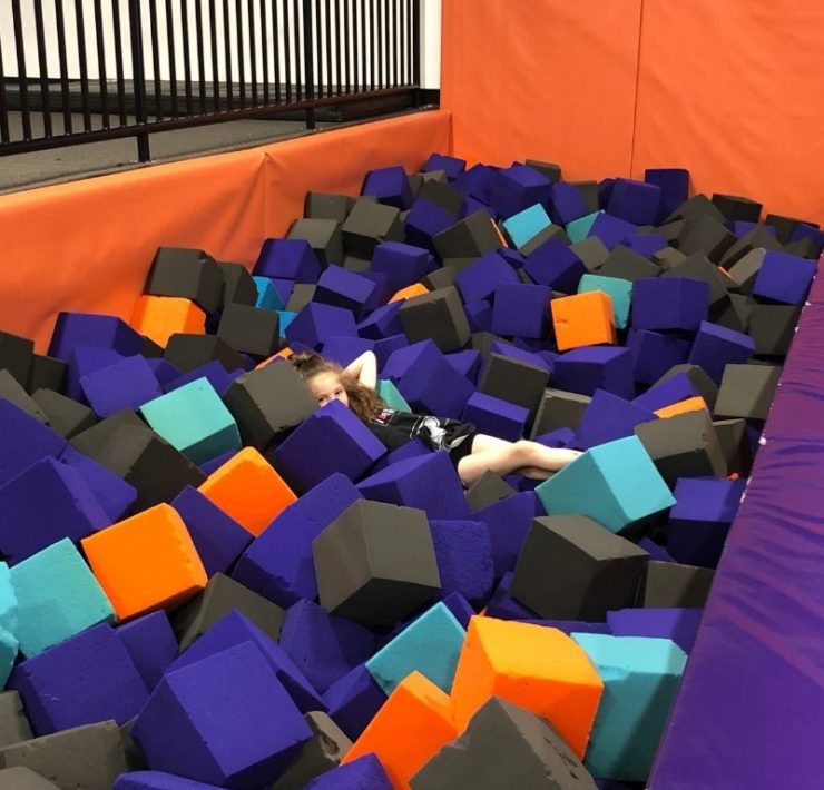 relaxing in the foam pit at Altitude