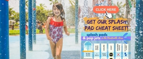 young girl playing in water fountains at a splash pad