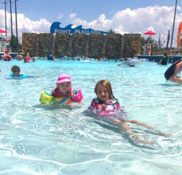 two young girls at Point Mallard Water Park wave pool