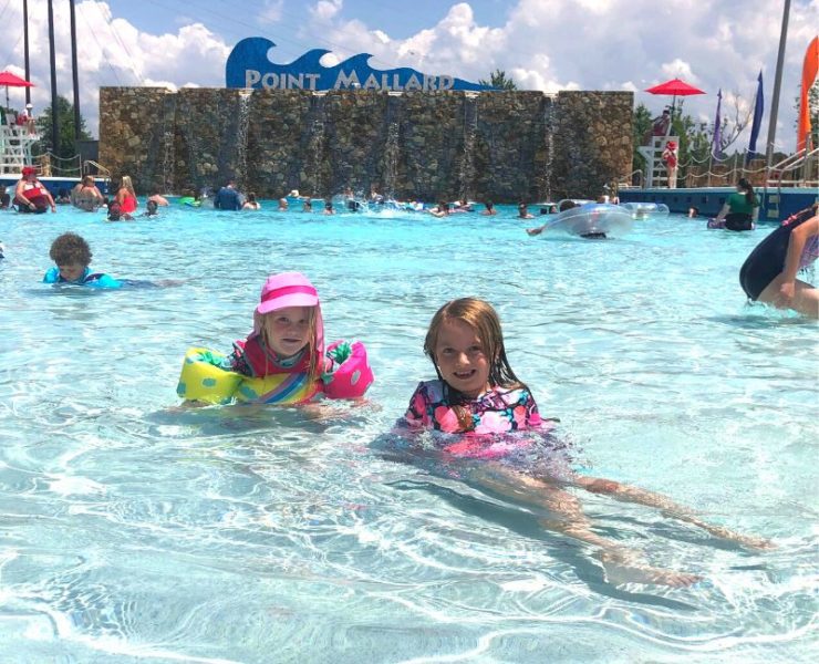 two young girls at Point Mallard Water Park wave pool
