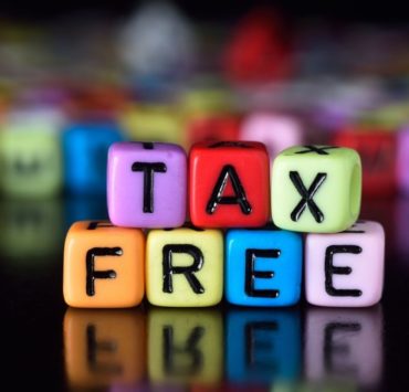 colorful beads spelling out tax free